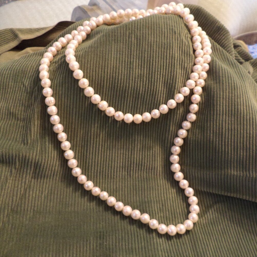 Faux Pearls - Necklace is 24” Length Color: Ivory
